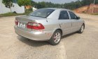 Mazda 626   2.0 MT  2003 - Bán ô tô Mazda 626 2.0 MT năm 2003, màu bạc còn mới  