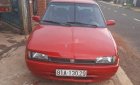 Mazda 323 1993 - Cần bán xe Mazda 323 đời 1993, màu đỏ số sàn