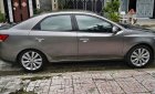 Kia Cerato   1.6 MT  2010 - Bán Kia Cerato 1.6 MT năm 2010, màu xám, xe nhập, giá chỉ 256 triệu