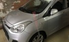 Hyundai Grand i10  1.0 MT Base  2015 - Bán Hyundai Grand i10 1.0 MT Base sản xuất 2015, màu bạc, xe nhập còn mới