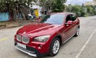 BMW X1 2010 - Cần bán gấp BMW X1 đời 2010, màu đỏ, xe nhập còn mới