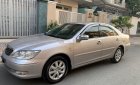 Toyota Camry 2004 - Bán Toyota Camry sản xuất 2004, màu bạc số tự động