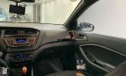 Hyundai i20 Active 2015 - Cần bán gấp Hyundai i20 Active đời 2015, màu trắng, nhập khẩu Hàn Quốc