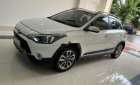 Hyundai i20 Active 2015 - Cần bán gấp Hyundai i20 Active đời 2015, màu trắng, nhập khẩu Hàn Quốc