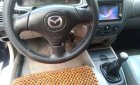 Mazda 323 2004 - Bán ô tô Mazda 323 2004, màu đen