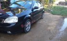 Daewoo Lacetti   EX 1.6 MT   2004 - Cần bán xe Daewoo Lacetti EX 1.6 MT 2004, màu đen, giá 86tr