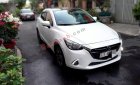 Mazda 2 2016 - Bán ô tô Mazda 2 sản xuất năm 2016, màu trắng xe gia đình, giá chỉ 385 triệu