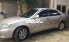 Toyota Camry 2004 - Bán Toyota Camry sản xuất năm 2004, màu bạc