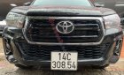 Toyota Hilux   2.4E AT  2020 - Cần bán xe Toyota Hilux 2.4E AT năm sản xuất 2020, màu đen, nhập khẩu 