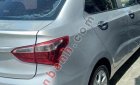 Hyundai Grand i10 2016 - Cần bán gấp Hyundai Grand i10 đời 2016, màu bạc xe gia đình