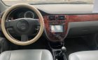 Daewoo Lacetti   2010 - Cần bán gấp Daewoo Lacetti sản xuất 2010, màu đen