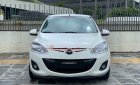 Mazda 2    2013 - Cần bán gấp Mazda 2 đời 2013, màu trắng còn mới