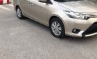 Toyota Vios   1.5 E  2015 - Cần bán Toyota Vios 1.5 E 2015, màu vàng