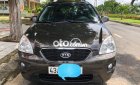 Kia Carens  2.0 MT  2016 - Cần bán lại xe Kia Carens 2.0 MT sản xuất năm 2016, màu nâu  