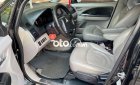 Mitsubishi Grandis     2005 - Bán Mitsubishi Grandis 2005, màu đen xe gia đình