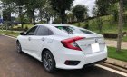 Honda Civic 1.8 E 2020 - Cần bán lại xe Honda Civic 1.8 E sản xuất 2020, màu trắng, xe nhập còn mới giá cạnh tranh