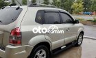 Hyundai Tucson 2010 - Cần bán gấp Hyundai Tucson đời 2010, màu bạc còn mới