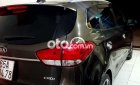 Kia Rondo 2015 - Cần bán lại xe Kia Rondo năm 2015, màu nâu, giá chỉ 485 triệu