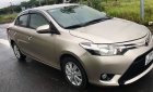 Toyota Vios   E AT   2017 - Cần bán Toyota Vios E AT đời 2017, màu ghi vàng