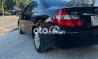 Toyota Camry 2004 - Cần bán gấp Toyota Camry sản xuất năm 2004, màu đen  