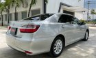 Toyota Camry   2.0E 2015 - Bán ô tô Toyota Camry 2.0E sản xuất năm 2015, màu bạc, 670 triệu