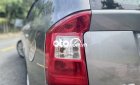 Kia Carens   2.0AT  2011 - Cần bán gấp Kia Carens 2.0AT đời 2011, màu xám xe gia đình, giá chỉ 315 triệu