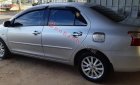 Toyota Vios E 2011 - Cần bán lại xe Toyota Vios E 2011, màu bạc xe gia đình