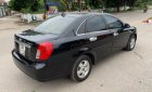 Chevrolet Lacetti 2011 - Cần bán lại xe Chevrolet Lacetti đời 2011, màu đen còn mới