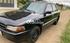 Mazda 323 1995 - Cần bán lại xe Mazda 323 năm sản xuất 1995, màu đen, nhập khẩu