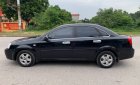 Chevrolet Lacetti 2011 - Cần bán lại xe Chevrolet Lacetti đời 2011, màu đen còn mới