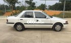 Mazda 323 1997 - Cần bán lại xe Mazda 323 đời 1997, màu trắng, xe nhập  