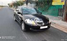 Mitsubishi Lancer 2003 - Cần bán xe Mitsubishi Lancer sản xuất năm 2003, màu đen còn mới giá cạnh tranh