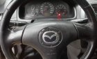 Mazda 323 2004 - Cần bán Mazda 323 sản xuất 2004, màu đen, giá tốt