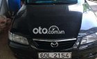 Mazda 626    2001 - Xe Mazda 626 2001, màu đen, xe nhập còn mới, giá 95tr