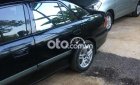 Mazda 626    2001 - Xe Mazda 626 2001, màu đen, xe nhập còn mới, giá 95tr