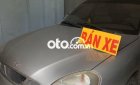 Daewoo Nubira MT 2003 - Cần bán gấp Daewoo Nubira MT 2003, màu bạc giá cạnh tranh