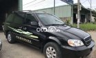 Kia Carnival 2006 - Bán Kia Carnival sản xuất năm 2006, màu đen, giá chỉ 158 triệu