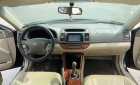 Toyota Camry 2.4G 2006 - Bán Toyota Camry 2.4G đời 2006, màu đen còn mới, 310tr