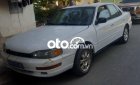 Toyota Camry  MT 1994 - Cần bán gấp Toyota Camry MT năm sản xuất 1994, màu trắng, xe nhập 