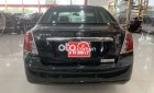 Daewoo Lacetti  EX 1.6MT  2009 - Cần bán lại xe Daewoo Lacetti EX 1.6MT năm sản xuất 2009, màu đen