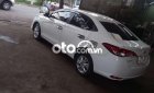 Toyota Vios  E   2019 - Cần bán lại xe Toyota Vios E đời 2019, màu trắng xe gia đình