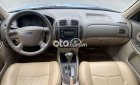Ford Laser   1.8AT 2004 - Cần bán Ford Laser 1.8AT sản xuất 2004, màu bạc, xe nhập  