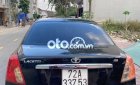 Daewoo Lacetti EX 1.6 MT 2005 - Cần bán lại xe Daewoo Lacetti EX 1.6 MT sản xuất 2005, màu đen, 135 triệu