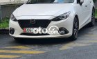 Mazda 3  1.5AT  2016 - Cần bán lại xe Mazda 3 1.5AT năm sản xuất 2016, màu trắng