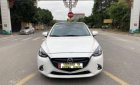 Mazda 2 1.5AT 2016 - Cần bán lại xe Mazda 2 1.5AT sản xuất 2016, màu trắng còn mới