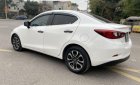 Mazda 2 1.5AT 2016 - Cần bán lại xe Mazda 2 1.5AT sản xuất 2016, màu trắng còn mới