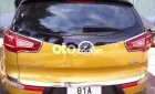 Kia Sportage 2011 - Cần bán gấp Kia Sportage 1.6GDi sản xuất năm 2011, màu vàng, nhập khẩu