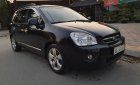 Kia Carens   2.0 AT 2009 - Cần bán gấp Kia Carens 2.0 AT năm sản xuất 2009, màu đen