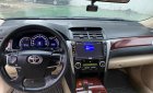 Toyota Camry 2.0E 2013 - Bán Toyota Camry 2.0E năm sản xuất 2013, màu đen, xe gia đình sử dụng rất cẩn thận giữ gìn, bảo dưỡng định kỳ đầy đủ tại hãng