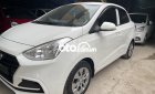 Hyundai Grand i10  1.2MT Base 2019 - Bán Hyundai Grand i10 1.2MT Base năm sản xuất 2019, màu trắng